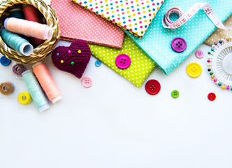 Sewing accessories on a white background