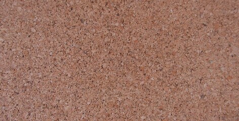 Brown cork wood background showing grain and mottled detail with copy space