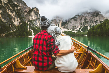Couple of lovers at Braies lake, Italy