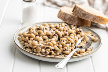 Marinated black eyed beans on plate.