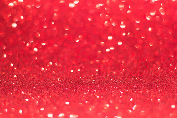 Bright beautiful sparkling red background with bokeh effect
