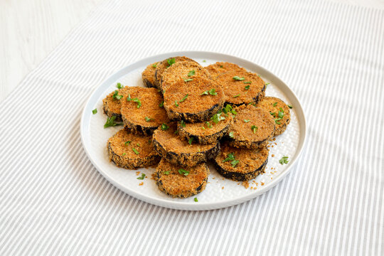 Homemade Garlic Parmesan Baked Eggplant On A Plate, Low Angle View.