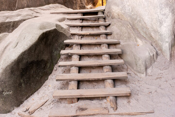 Wooden ladder between the sandstone rocks. Adrspach rock city, Czech Republic, Europe