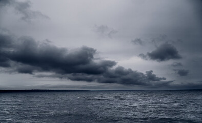 dark stormy sea and dramatic clouds, gloomy nature