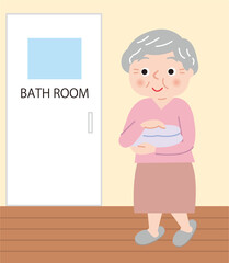 暖かい部屋からお風呂に入るシニア女性