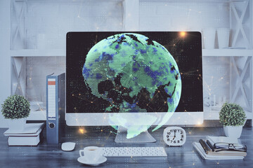 Computer on desktop with social network hologram. Double exposure. Concept of international people connections.