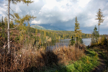Obraz premium Nature mountain scene with beautiful lake in Slovakia Tatra - Strbske pleso