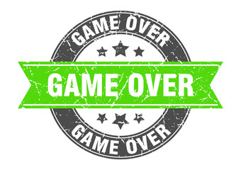 Obraz premium game over round stamp with ribbon. label sign