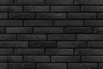 Black stone block wall seamless background and pattern texture