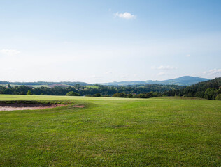 Obraz premium landscape with green grass and sky golf field