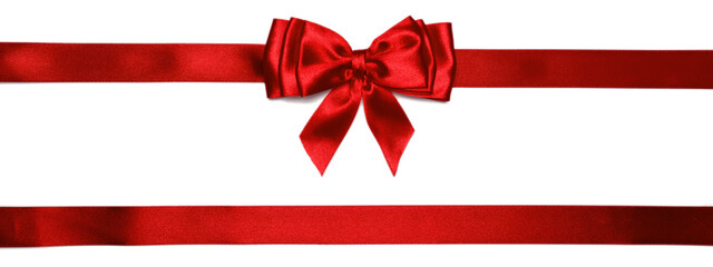 Red shiny bow with ribbons with long ribbon extending on both sides.