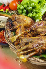 Fried duck spices with spicy red sambal.
