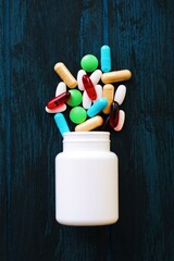 Bottle with different pills on color background  flat lay - 378721941