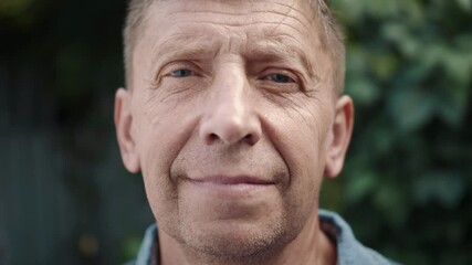 Close up portrait of mature businessman smiling confident enjoying success. Face of attractive senior man close up. Elderly male looking at the camera and smiling. - Powered by Adobe