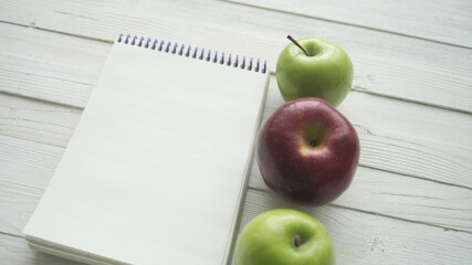 healthy eating, dieting, slimming and weigh loss concept - close up of diet plan pape