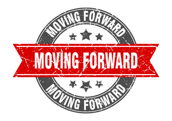 Obraz premium moving forward round stamp with ribbon. label sign