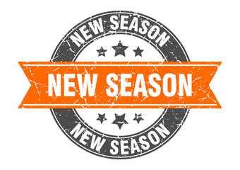 new season round stamp with ribbon. label sign