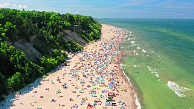 Aerial view of crowded beach during pandemic, Baltic Sea