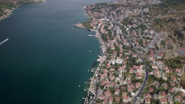 Areal footage over Kotor Montenegro  flying from old town to St Mathias Church. Low traffic area with few dozens private boats.