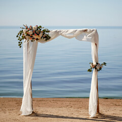 Flower arch on the lake shore. Background for wedding invitations.