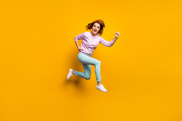 Full body profile side photo of crazy enthusiastic excited woman jump run after autumn black friday discounts wear casual style pink clothing isolated over yellow color background