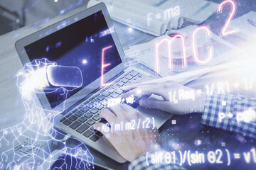 Science formula hologram with man working on computer on background. Education concept. Double...