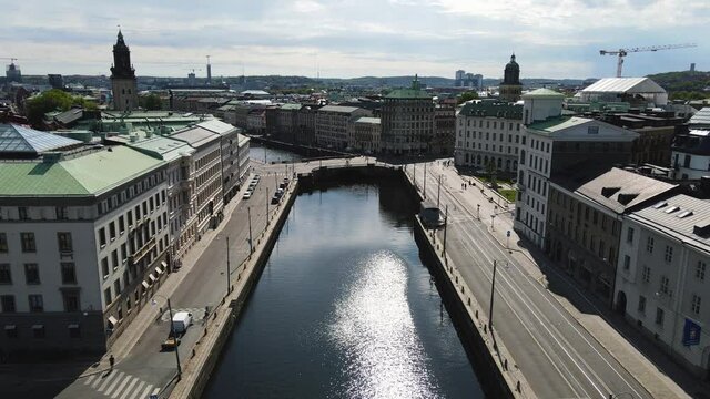 Overflying The Big Harbour Canal And The Tower Of Christina Church At Daytime In The Central Gothenburg, Sweden. - aerial drone shot