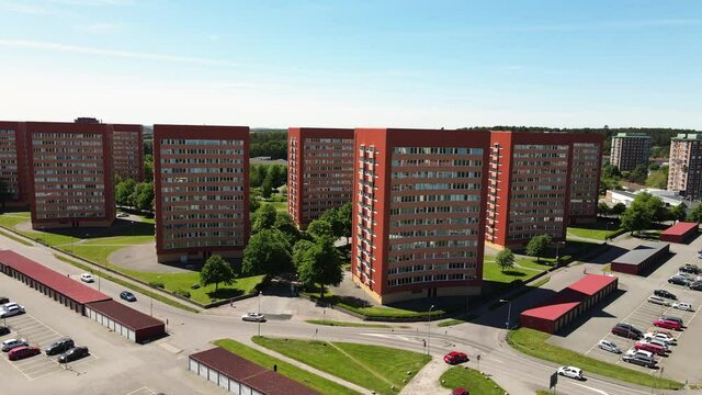 Rows Of High-Rise Apartment Buildings At Fagottgatan, Vastra FrolundaIn In Gothenburg, Sweden. Riksbyggens BRF Goteborgshus  - aerial pullback shot