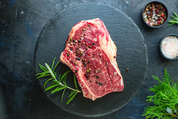 fresh raw steak rib eye meat beef juicy on the table serving size top view copy space for text food background rustic