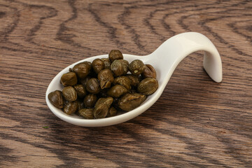 Tasty capers in the bowl