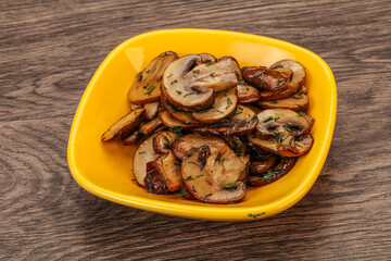 Roasted champignon with herbs and spices