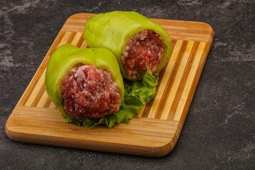 Raw stuffed pepper for cooking