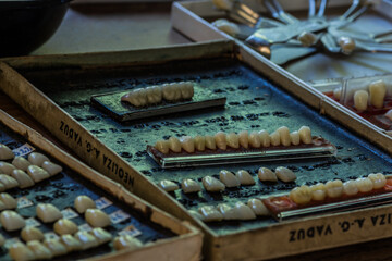 old implants on a table in a house from a dental technician