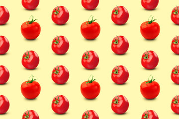 Colorful seamless pattern of tomatoes on a yellow background. Red tomatoes geometric pop art composition. Creative minimal summer flat lay.