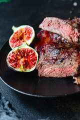 fresh beef steak ribeye grilled veal meat juicy and fried rare or medium on the table tasty top view place copy space for text food background rustic