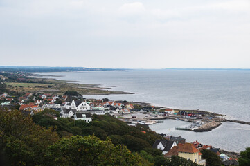 Fototapeta na wymiar The small coastal town of Mölle placed on the cliffs towards the water in southern Sweden