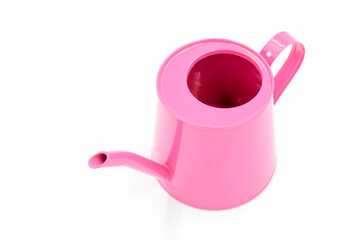 Pink metal watering can