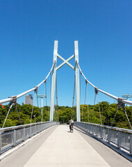 Suspension cycle and pedestrian bridge over the Horikawa river  in downtown Nagoya, Japan