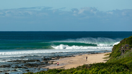 Seascape with blue ocean and breaking waves