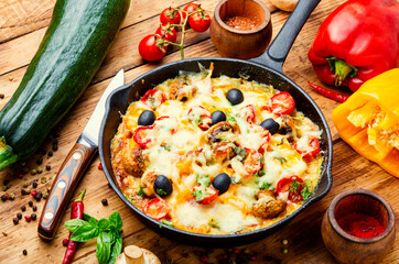 Tasty pizza and cooking ingredients