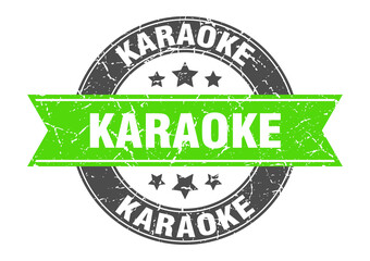 Fototapeta premium karaoke round stamp with ribbon. label sign