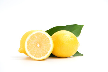 Cut in half and whole lemons isolated on white background