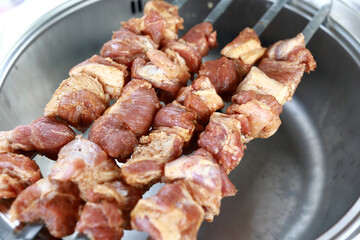 Fresh pork on skewers