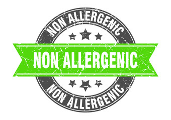 non allergenic round stamp with ribbon. label sign