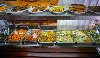 Warteg or warung Tegal in Indonesia. It's Indonesian restaurant, street culinary with traditional food. 