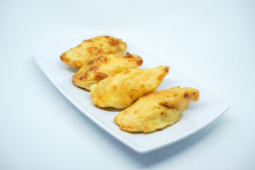 Fried banana on top of pring. Typical snacks from Indonesia