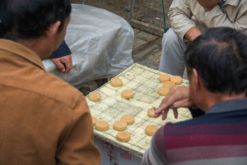 Chinese men playing 