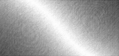 Light halftone dots grunge wide background
