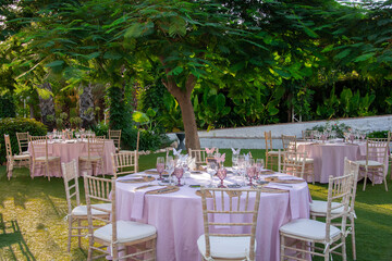 Beautiful events table setting in the middle of the forest for family meetings and parties