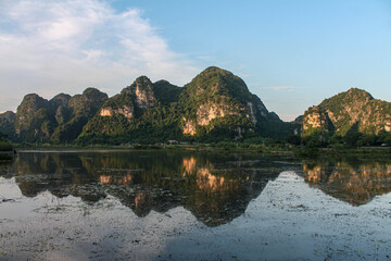 reflection of tropical hills 